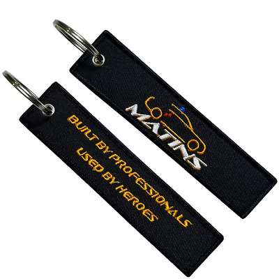Groothandel Olecranon Hook Goedkoop Op maat gemaakt Vliegstof Borduurwerk Jet tag Geweven Sleutelhanger Met Je Eigen Logo