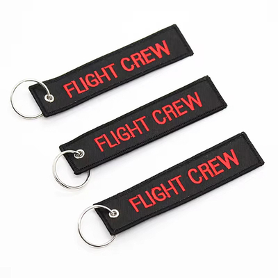 Groothandel Olecranon Hook Goedkoop Op maat gemaakt Vliegstof Borduurwerk Jet tag Geweven Sleutelhanger Met Je Eigen Logo