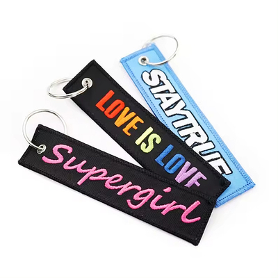 Gepersonaliseerde geborduurde sleutelhanger met aangepast logo promotieve mode geweven stof sleutel tag sleutelhanger