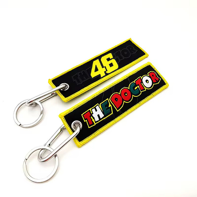 Custom Logo Promotiegeschenken Jet Tag Stof Borduurwerk Autosleutelhangers Geweven Sleutelhanger