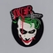 De Joker borduurde Ijzer op de Stoffenachtergrond van de Flard3x2inch Keperstof